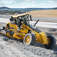 Verlagerung der Baggerlader und Motorgrader nach China