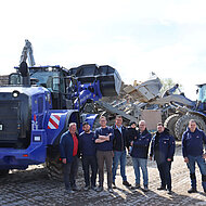 Emissionsarmer Radlader 966XE unterstützt Schlitzwandlager für Bau der U5 in Hamburg 