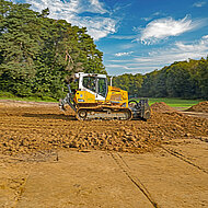 Planierraupe übernimmt Schlüsselrolle