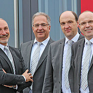 Vorzeitige Vertragsverlängerung der drei Geschäftsführer